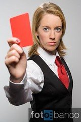 Woman holding red card